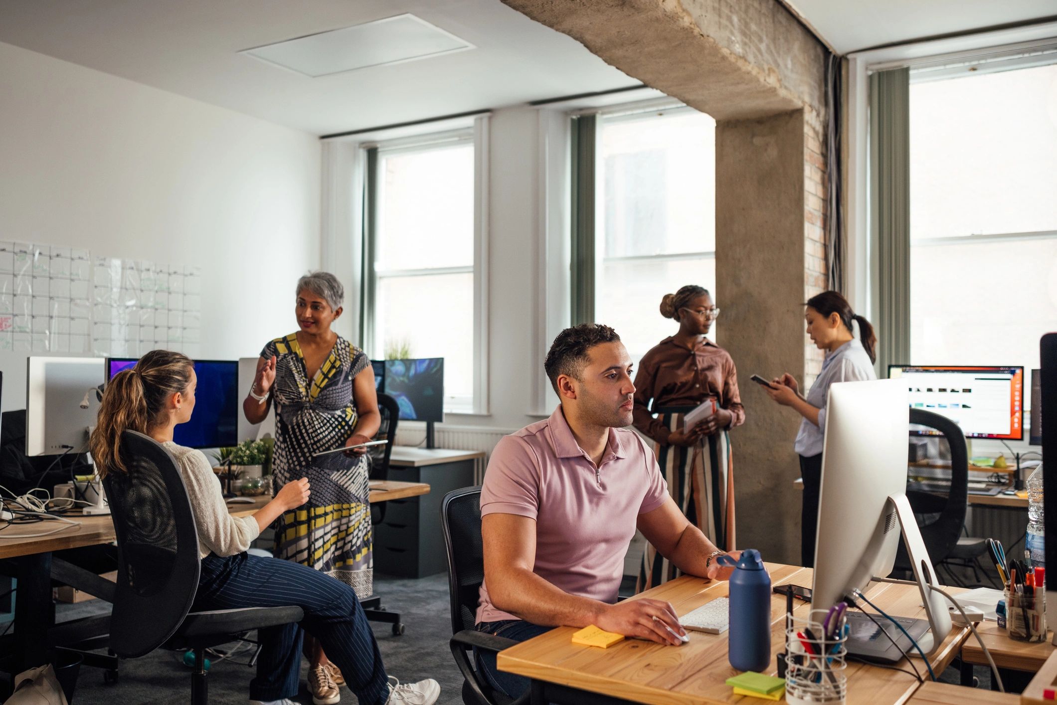 Professional team collaborating in an office